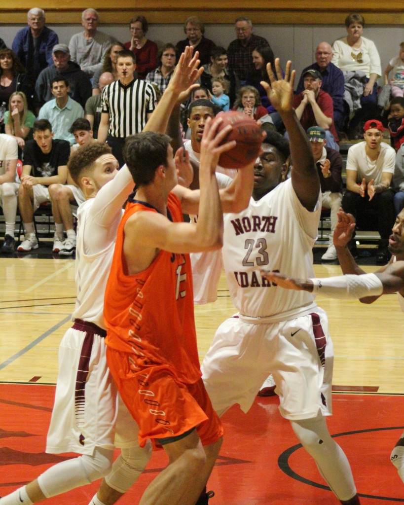 NIC's Trey Burch-Manning and Ziggy Satterthwaite establish a defensive swarm against a Snow College player. Satterthwaite had a team-high eight rebounds for the game.
