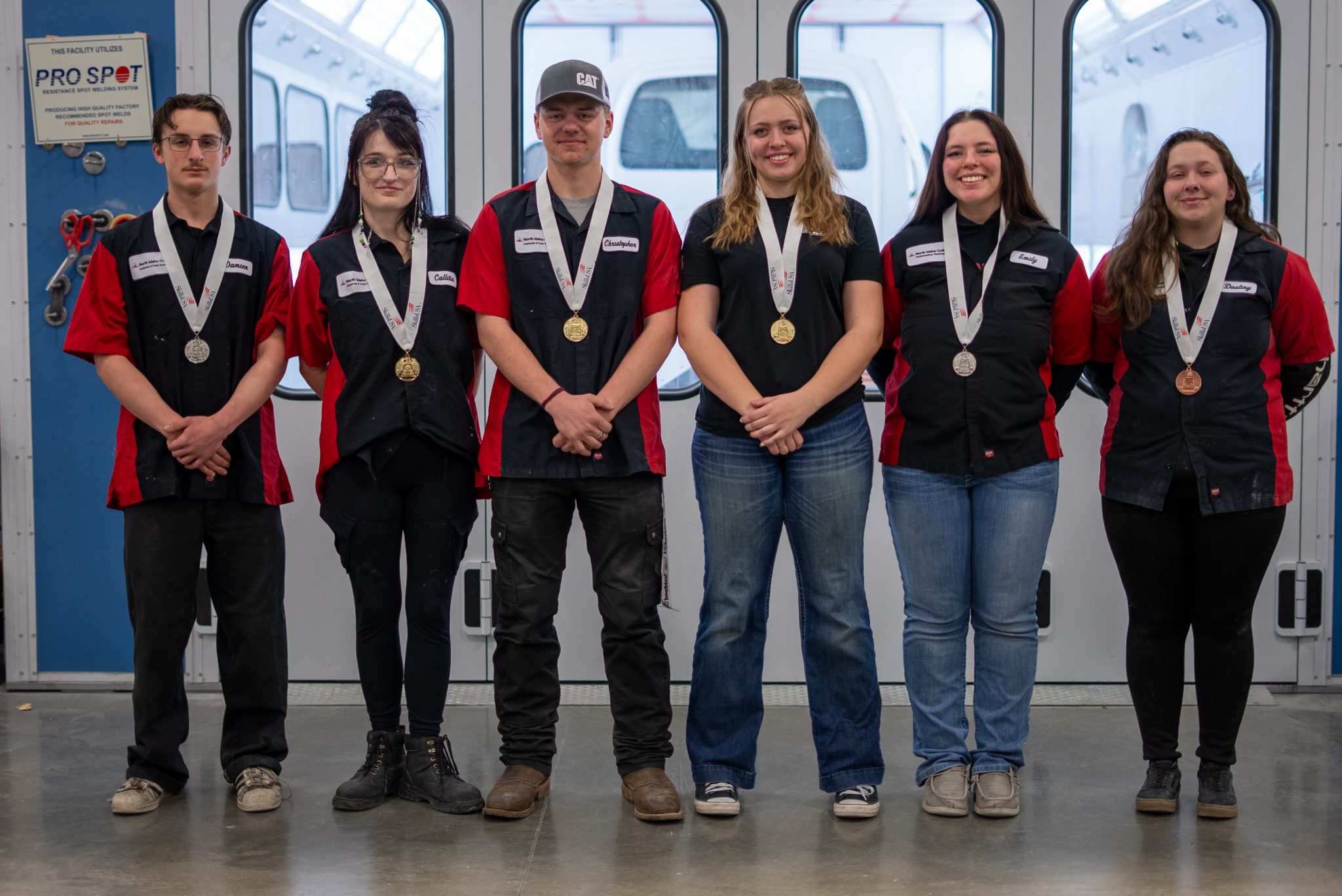 From left, NIC autobody students Damien Nord-Fencl, Callitia McClintock, Chris Brandt, Zoe Hunt, Emily Vig and Destiny Shamblin pose for a photo with their medals from the Idaho SkillsUSA State Leadership and Skills Conference.